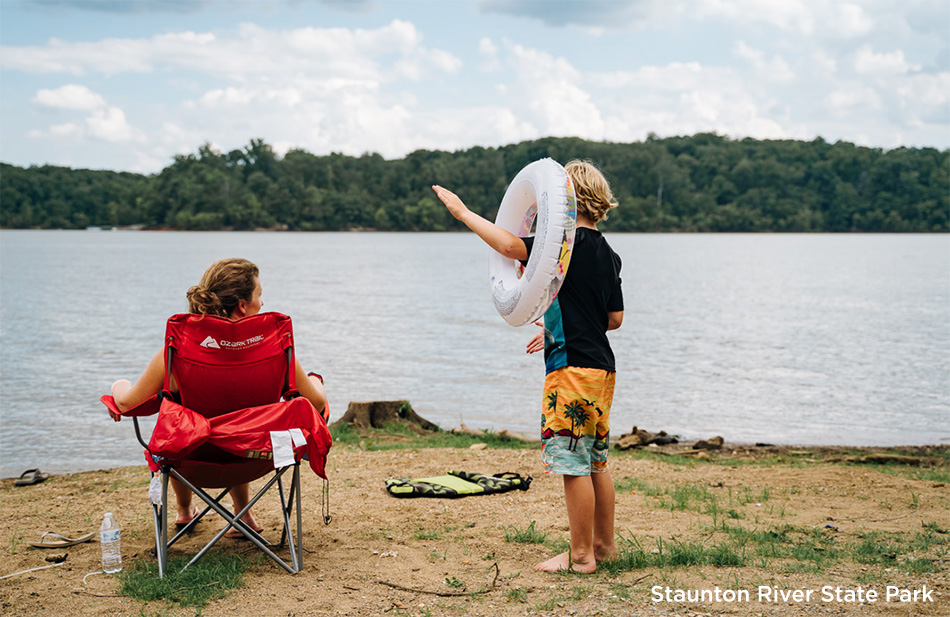 photo of mother & son on shore of Staunton River State Park